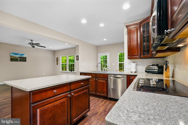 31 Crescent Links Dr, North East, MD 21901 - kitchen featuring a sink, dark wood-type flooring, backsplash, appliances with stainless steel finishes, and recessed lighting