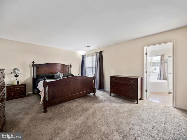 128 Whitman Ln, Inwood, WV 25428 - bedroom with ensuite bathroom, carpet flooring, visible vents, and baseboards