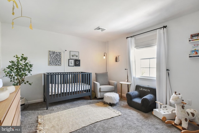 1003 E Cherry St, Palmyra, PA 17078 - carpeted bedroom with visible vents and a crib