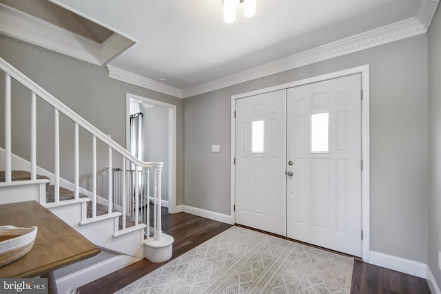 1003 E Cherry St, Palmyra, PA 17078 - entrance foyer featuring stairs, baseboards, crown molding, and wood finished floors