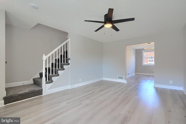4108 Rokeby Rd, Baltimore, MD 21229 - spare room featuring wood finished floors, stairway, ceiling fan, and visible vents