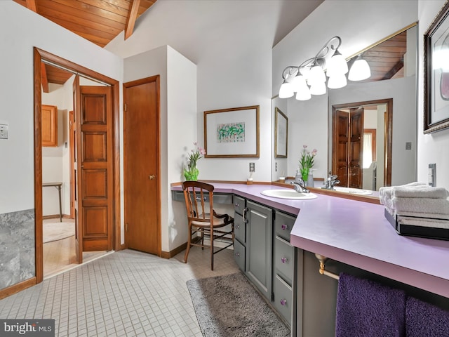 bathroom featuring vanity, wood ceiling, tile patterned floors, and vaulted ceiling