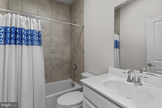 full bathroom with vanity, toilet, and shower / tub combo