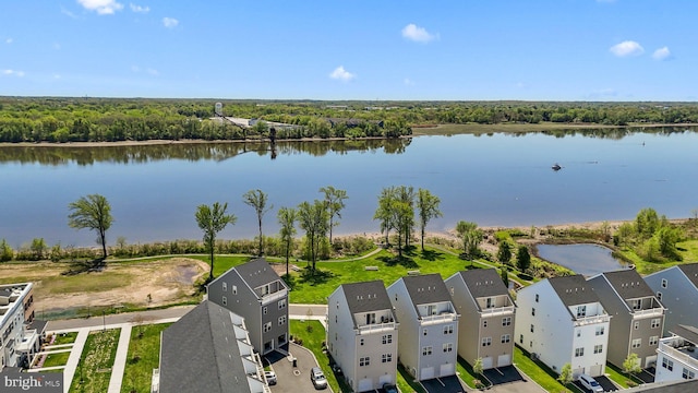 bird's eye view featuring a water view and a forest view