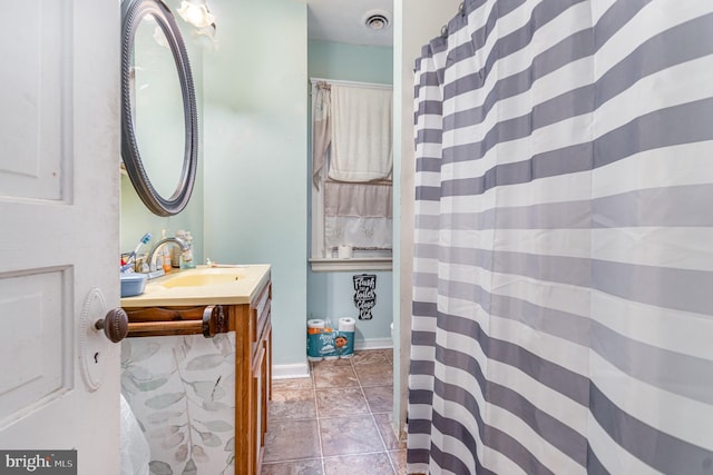 536 S Franklin St, Hanover, PA 17331 - full bath featuring visible vents, tile patterned floors, curtained shower, and vanity