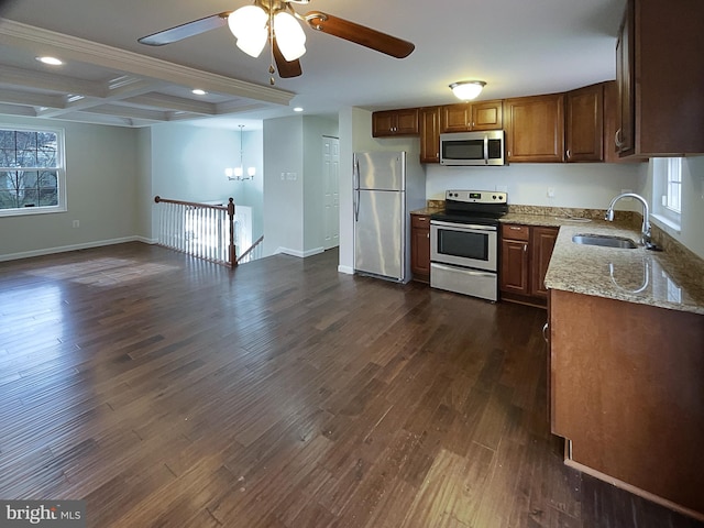 12702 Applecross Dr, Clinton, MD 20735 - kitchen featuring light stone counters, a sink, dark wood-style floors, stainless steel appliances, and ceiling fan with notable chandelier