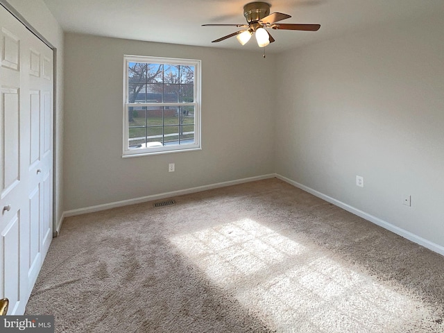 12702 Applecross Dr, Clinton, MD 20735 - unfurnished bedroom with a closet, baseboards, visible vents, ceiling fan, and carpet
