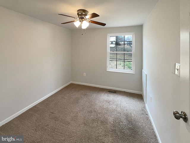 12702 Applecross Dr, Clinton, MD 20735 - carpeted spare room with baseboards, visible vents, and a ceiling fan