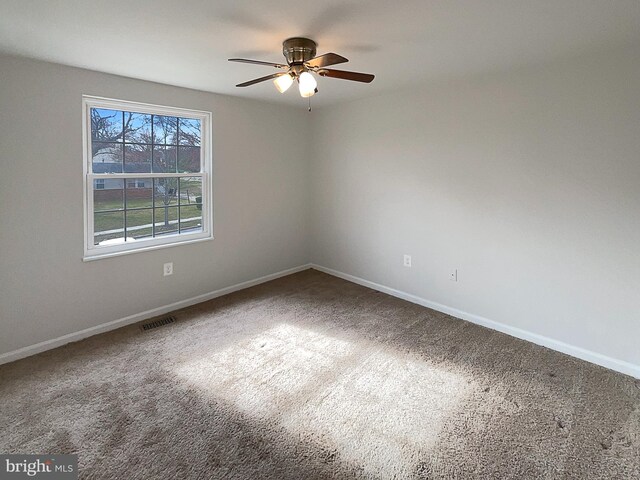 12702 Applecross Dr, Clinton, MD 20735 - carpeted spare room with baseboards, visible vents, and a ceiling fan
