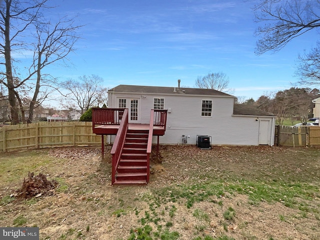 12702 Applecross Dr, Clinton, MD 20735 - rear view of property with a fenced backyard, central air condition unit, stairs, and a wooden deck