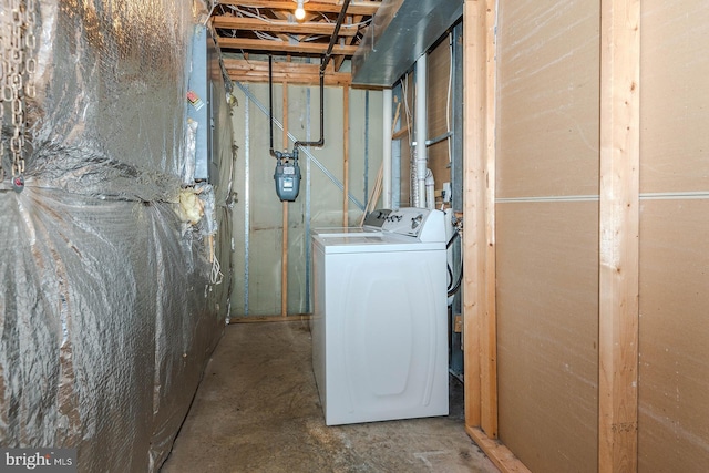 unfinished below grade area featuring washer / clothes dryer