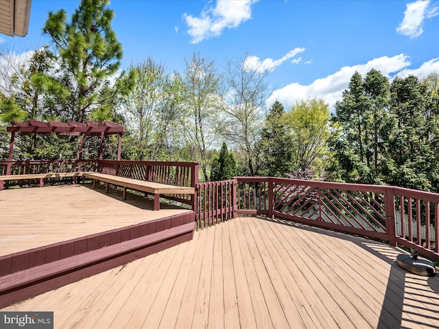 wooden terrace with a pergola