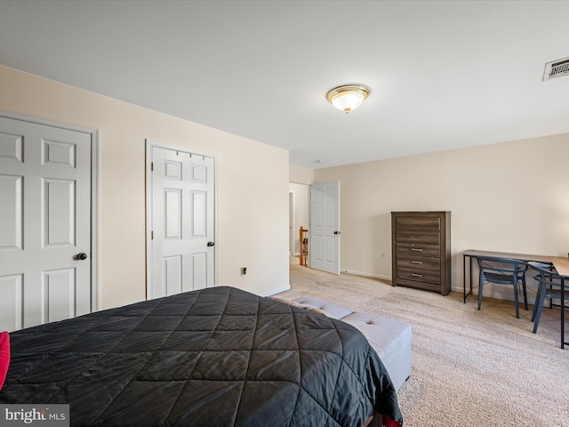 bedroom with visible vents, baseboards, and carpet flooring