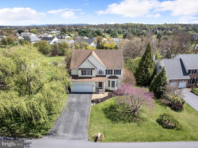 drone / aerial view featuring a residential view