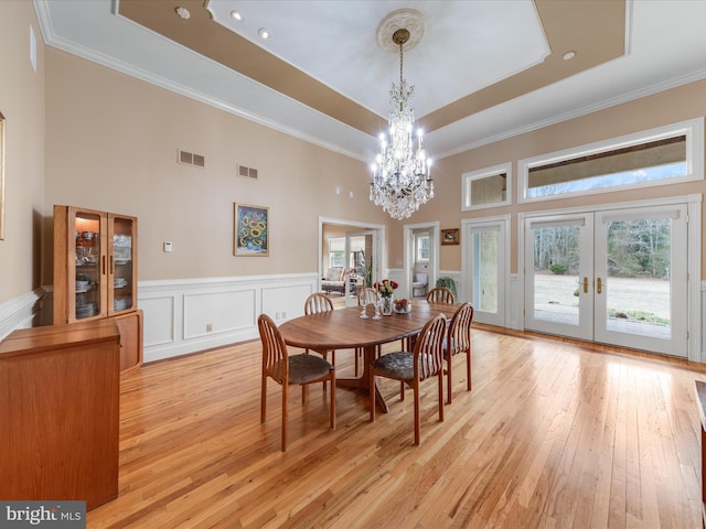 32828 Murray Rd, Frankford, DE 19945 - dining room featuring a tray ceiling, visible vents, an inviting chandelier, and french doors