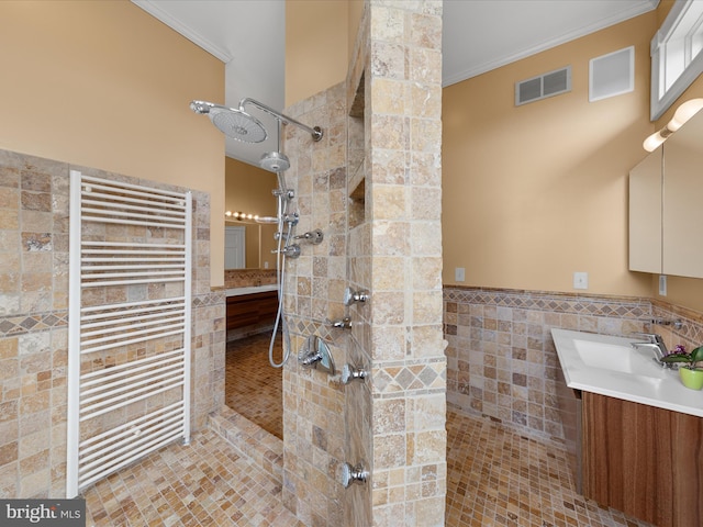 32828 Murray Rd, Frankford, DE 19945 - full bath with vanity, radiator, ornamental molding, visible vents, and a walk in shower