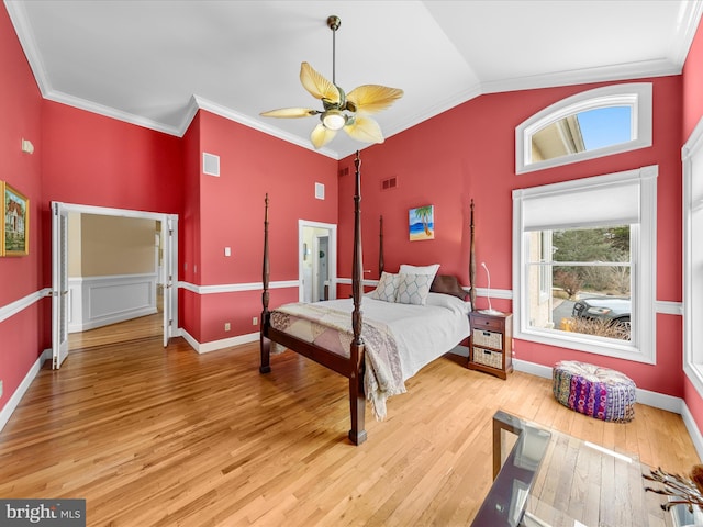 32828 Murray Rd, Frankford, DE 19945 - bedroom featuring light wood-style flooring, ornamental molding, vaulted ceiling, and visible vents