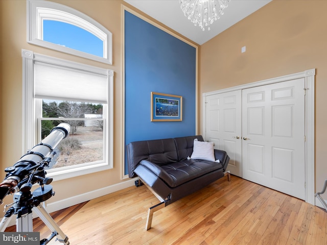 32828 Murray Rd, Frankford, DE 19945 - living area with baseboards, a notable chandelier, and light wood finished floors