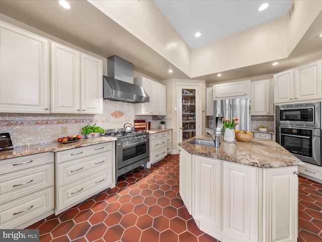32828 Murray Rd, Frankford, DE 19945 - kitchen featuring light stone counters, a sink, wall chimney exhaust hood, tasteful backsplash, and stainless steel appliances