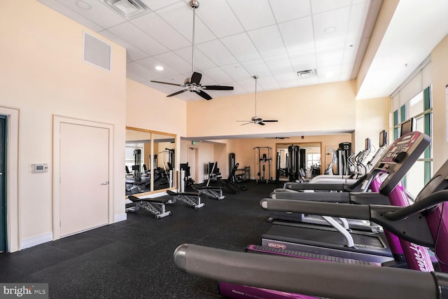 414 Water St Unit 1802, Baltimore, MD 21202 - workout area with a paneled ceiling, a ceiling fan, a towering ceiling, and visible vents