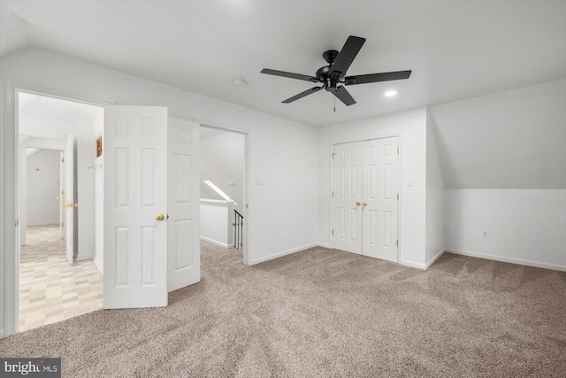 unfurnished bedroom with a closet, baseboards, carpet, and recessed lighting