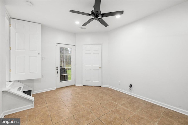 interior space featuring visible vents, baseboards, a ceiling fan, and recessed lighting