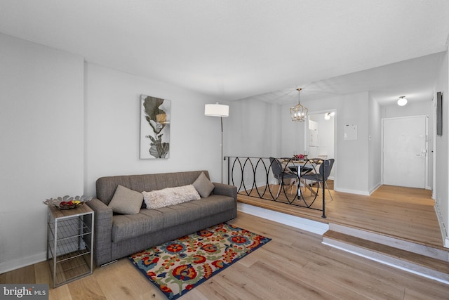 2201 L St NW Unit 515, Washington, DC 20037 - living area with a chandelier and wood finished floors