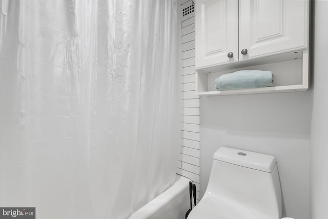 2201 L St NW Unit 515, Washington, DC 20037 - bathroom with toilet and shower / bath combo with shower curtain