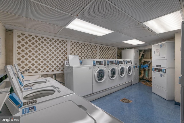 2201 L St NW Unit 515, Washington, DC 20037 - communal laundry room with stacked washer / drying machine and washing machine and dryer