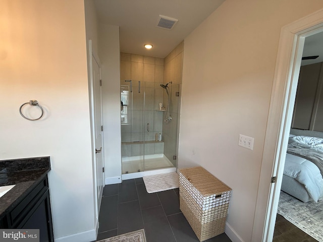 8676 Underhill Ln, Manassas, VA 20112 - full bathroom with visible vents, baseboards, tile patterned flooring, vanity, and a stall shower