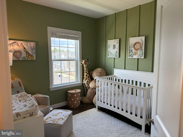 8676 Underhill Ln, Manassas, VA 20112 - bedroom featuring a nursery area and baseboards