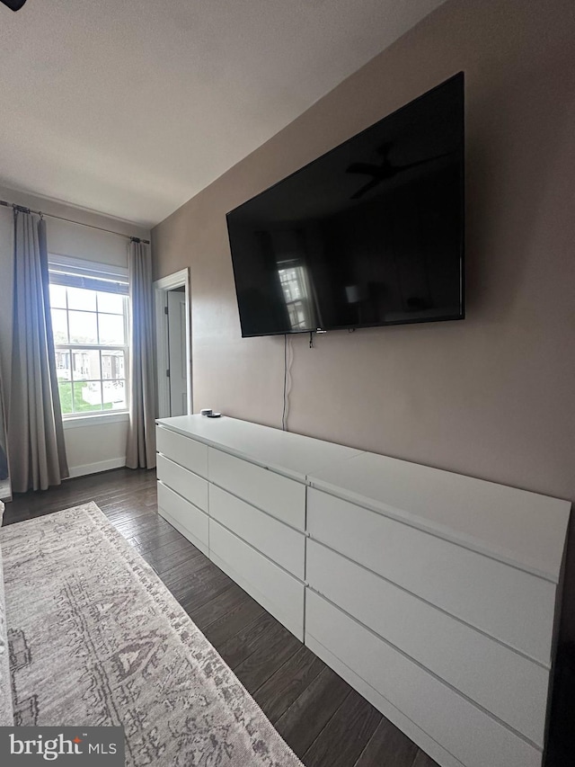 8676 Underhill Ln, Manassas, VA 20112 - bedroom with dark wood-style flooring and baseboards
