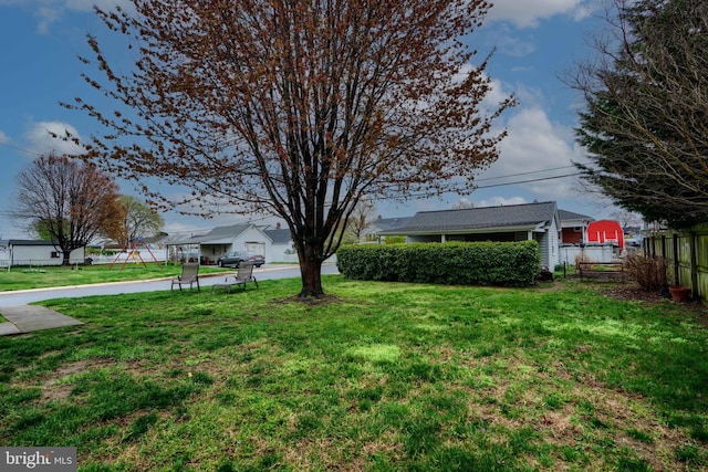 view of yard with fence