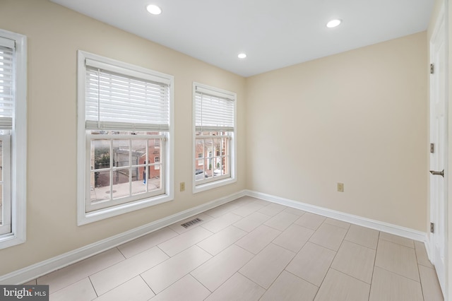 922 Fell St, Baltimore, MD 21231 - unfurnished room featuring baseboards, visible vents, and recessed lighting