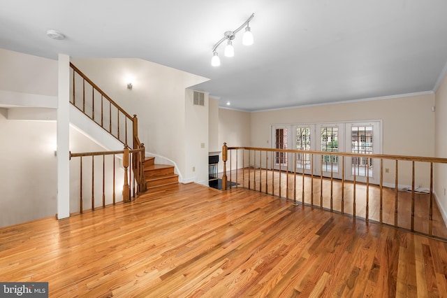 922 Fell St, Baltimore, MD 21231 - empty room featuring wood finished floors, ornamental molding, and visible vents