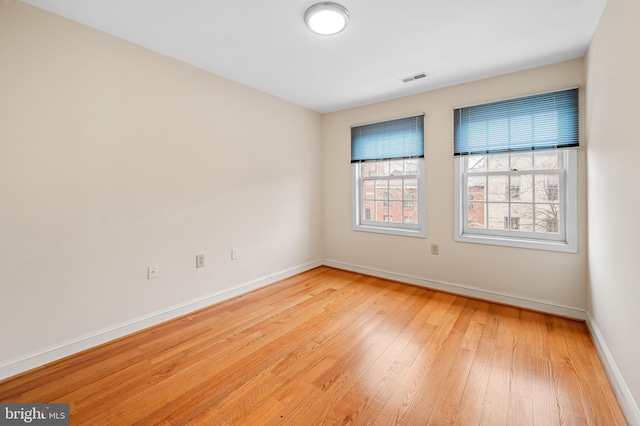 922 Fell St, Baltimore, MD 21231 - empty room featuring light wood-style floors, baseboards, and visible vents