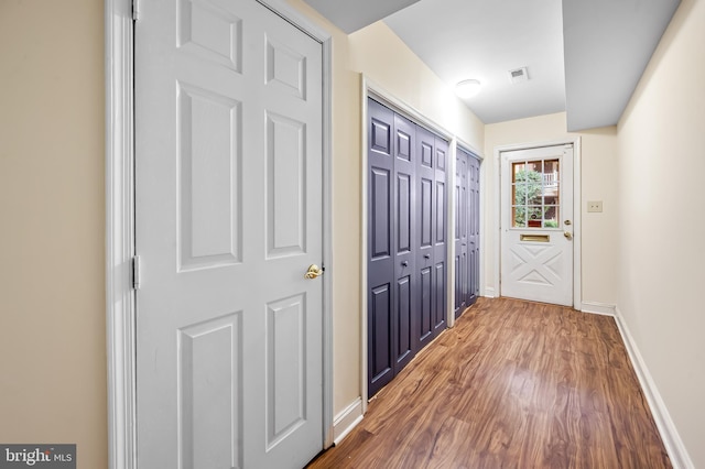 922 Fell St, Baltimore, MD 21231 - hall with baseboards and wood finished floors