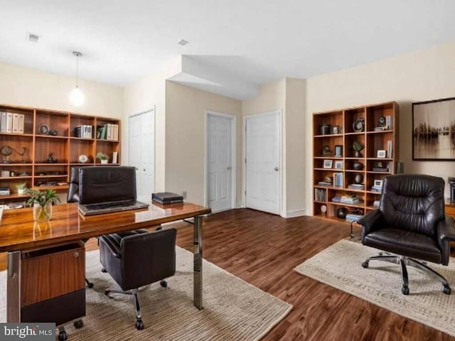 922 Fell St, Baltimore, MD 21231 - office area featuring wood finished floors and visible vents