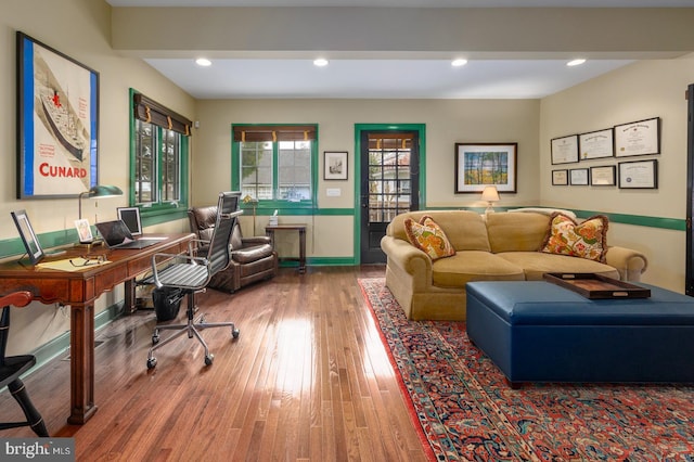 office space with baseboards, recessed lighting, and wood finished floors