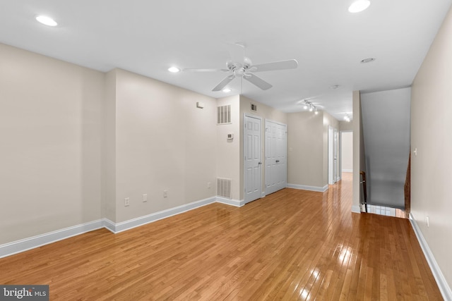 2415 Saint Paul St, Baltimore, MD 21218 - empty room with light wood-type flooring, baseboards, a ceiling fan, and recessed lighting