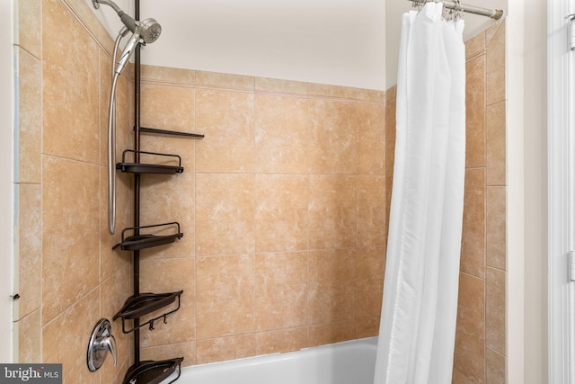 2415 Saint Paul St, Baltimore, MD 21218 - bathroom featuring shower / bath combo with shower curtain