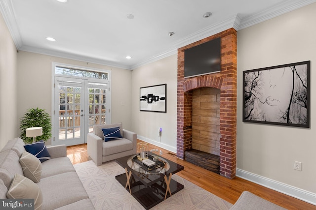 2415 Saint Paul St, Baltimore, MD 21218 - living area with baseboards, wood finished floors, french doors, recessed lighting, and ornamental molding