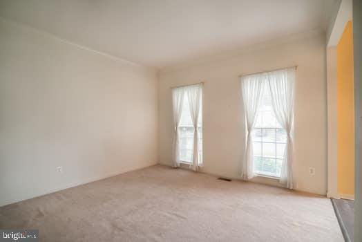 17661 Avenel Ln, Dumfries, VA 22026 - unfurnished room with plenty of natural light and light colored carpet