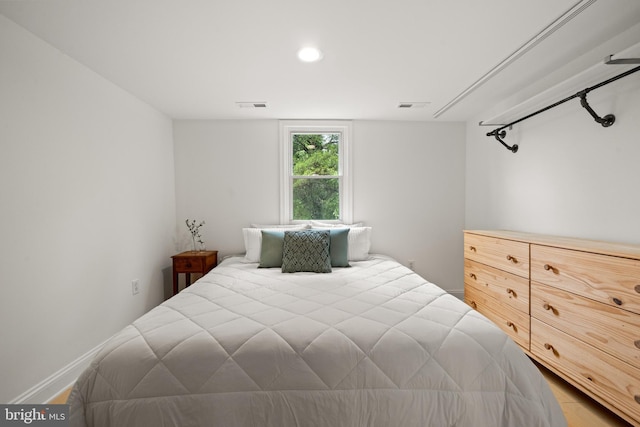 bedroom with recessed lighting