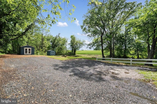 view of dirt / gravel driveway