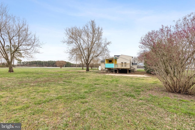 view of yard with a deck