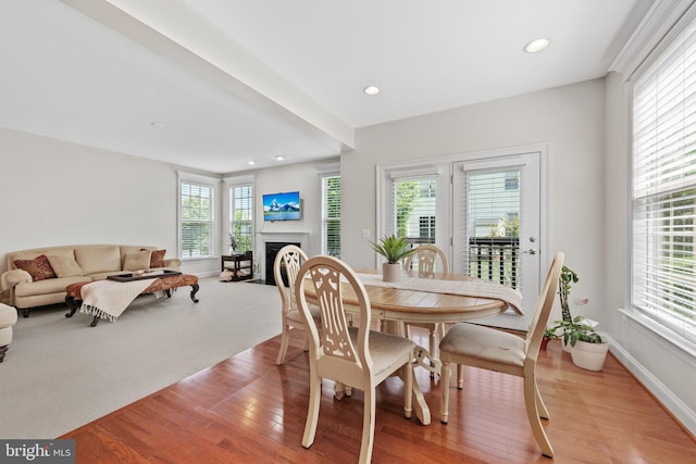 42694 Chisholm, Broadlands, VA 20148 - dining room with light wood finished floors, a fireplace with flush hearth, baseboards, and recessed lighting