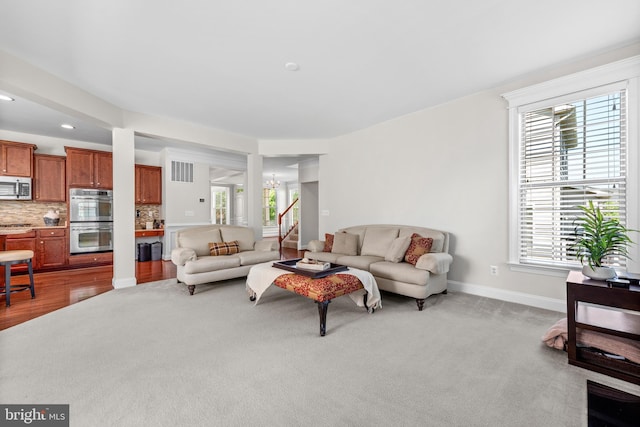42694 Chisholm, Broadlands, VA 20148 - living area with baseboards, stairs, carpet floors, and recessed lighting