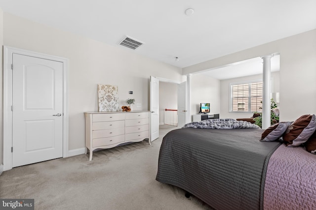 42694 Chisholm, Broadlands, VA 20148 - bedroom featuring light colored carpet and ornate columns
