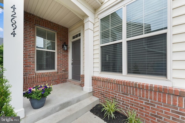 42694 Chisholm, Broadlands, VA 20148 - entrance to property featuring covered porch and brick siding